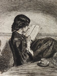 Lecture à la lumière de la lampe